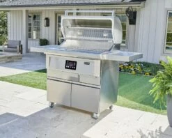 Coyote 36-Inch Freestanding Pellet Grill With Portable Cart - C1P36-FS 30 Coyote 36-Inch Freestanding Pellet Grill With Portable Cart - C1P36-FS -BBQDIRECT Sales 36 freestanding lifestyle front shelves out lid open