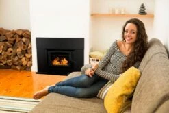 Buck Stove Model 74 Wood Insert With Blower - Heats Up To 2600 Square Feet -BBQDIRECT Sales model74 blackdoor blacktrimkit inuse